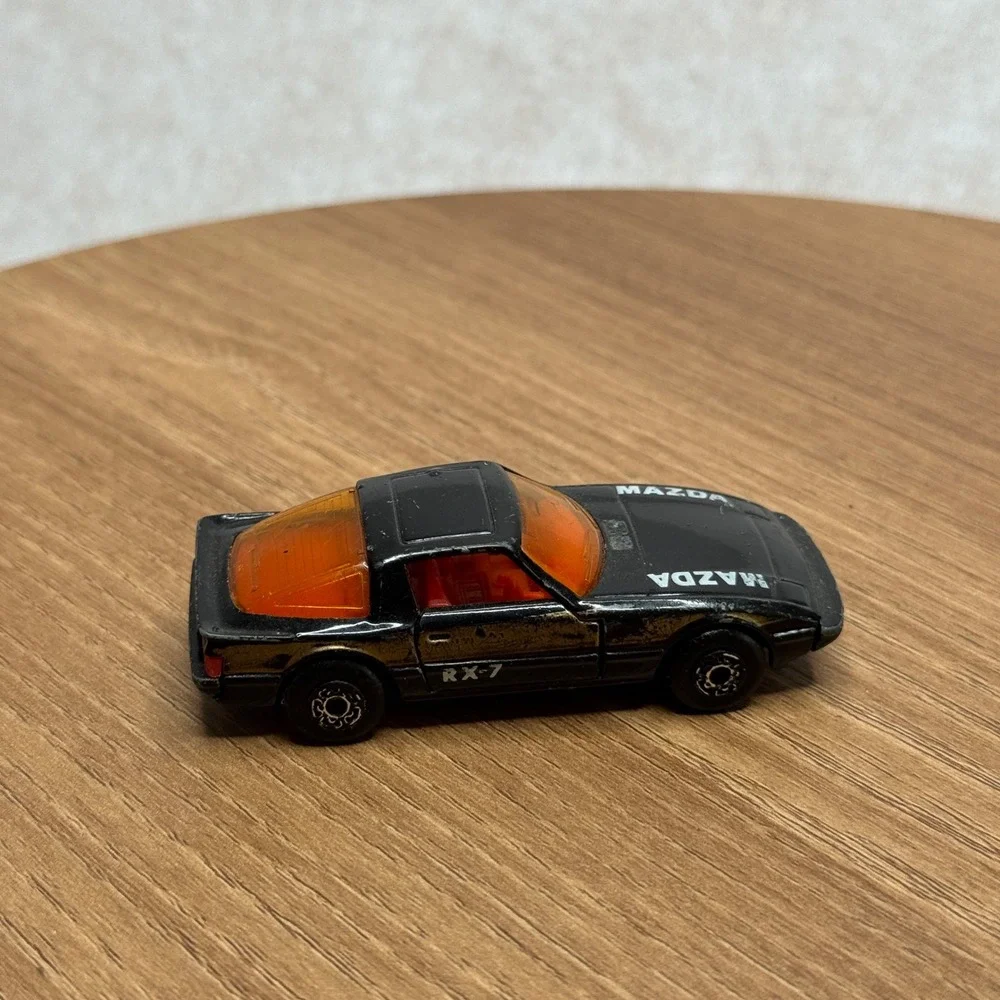 Vintage 1980s matchbox Mazda RX-7 Toy Car Black Diecast Collectible doors open‎